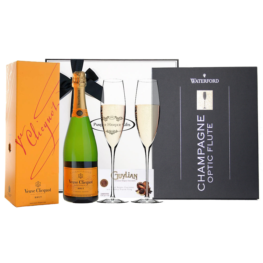 Veuve Clicquot Champagne Brut 750ml, Waterford Crystal Champagne Optic Flutes and Ferrero Rocher triple pack chocolates.  Packed beautifully in our signature gift box.