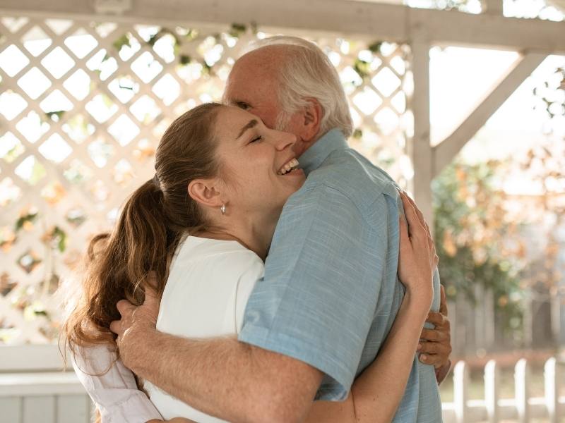 Girl hugging her dad for Father's Day