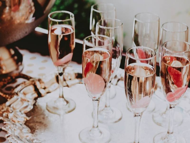 Pink champagne in delicate flutes