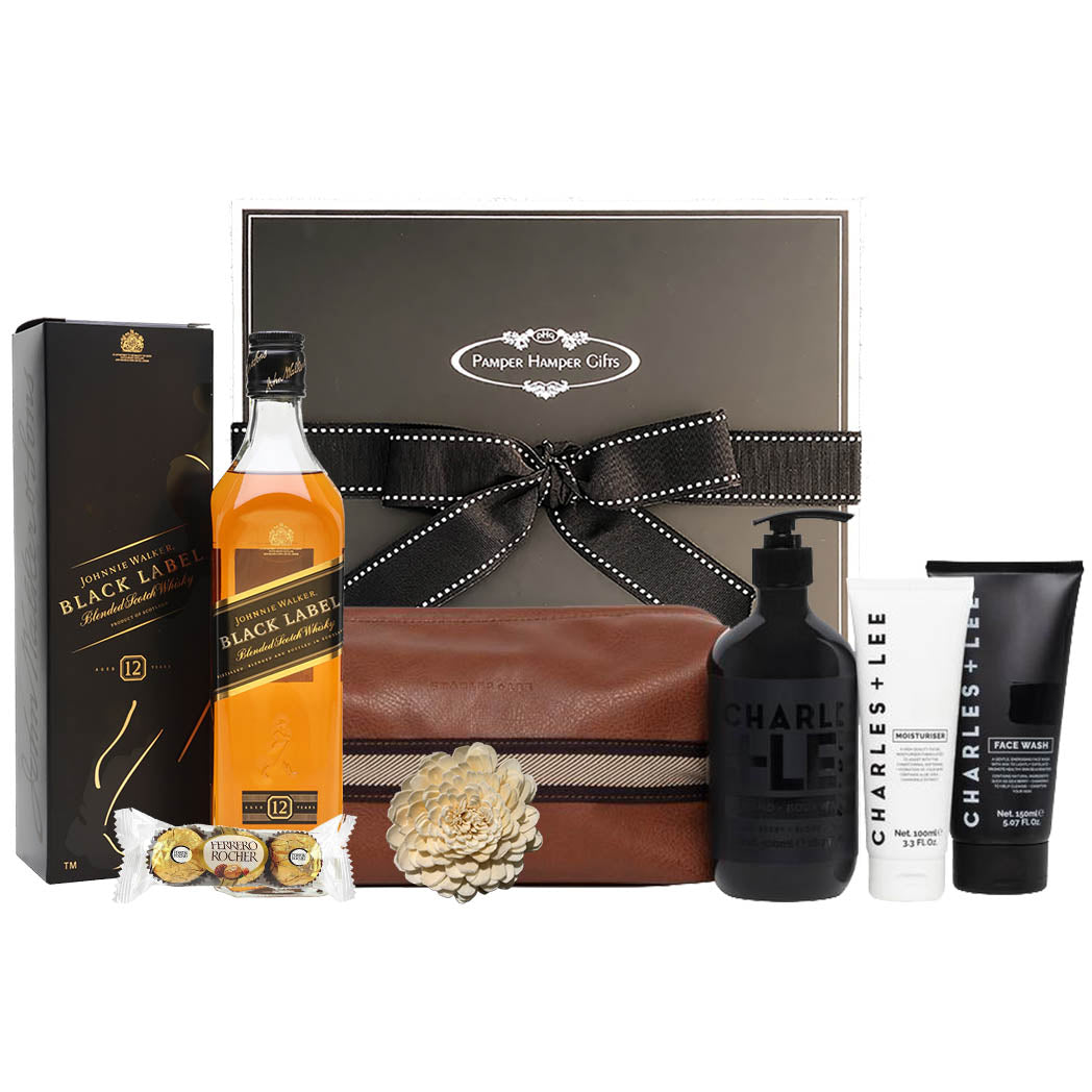 Johnnie Walker Black Label Whisky 700ml, Ferrero Rocher Chocolate Trio and Charles + Lee Daily Essentials Pack containing Face Wash 150ml, Moisturiser 100ml, Hand & Body Wash 500ml in a Reusable Toiletry Bag beautifully packaged in our signature packaging